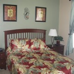 Queen Master Suite - Queen-size bed with a 32” Plasma TV and an adjacent full bath