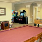 The game room features a video arcade and billiard tables
